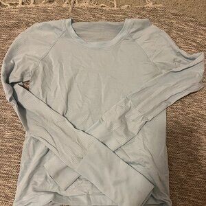 Lululemon Swiftly Tech 2.0,  Size 4, light blue $25 - Hip Length